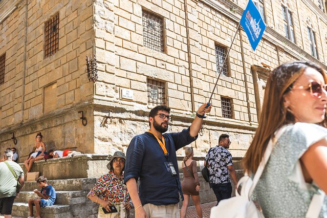 Rome: Tuscany & Montepulciano Day Trip with Lunch & Wine Tasting - Montepulciano: wine, towers, and steep streets