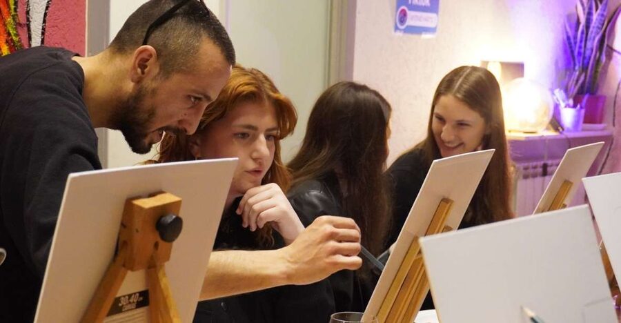 Rome: Wine and Paint Experience in Piazza Navona - The opening: wine, introductions, and a blank canvas