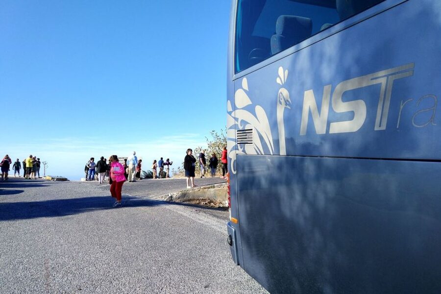 Santorini: Catamaran Cruise, Winery, & Oia Sunset Combo Tour - Oia sunset from a reserved viewpoint