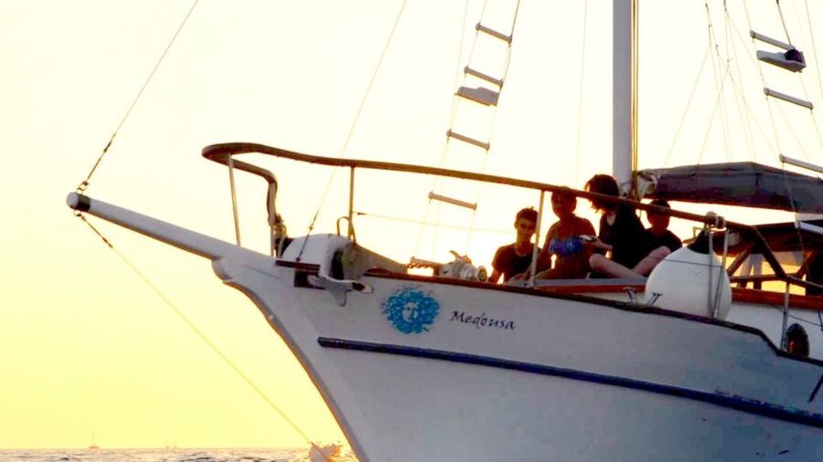 Santorini: Traditional Wooden Boat Tour with Meal and Wine - Red Beach, White Beach, and Black Mountain