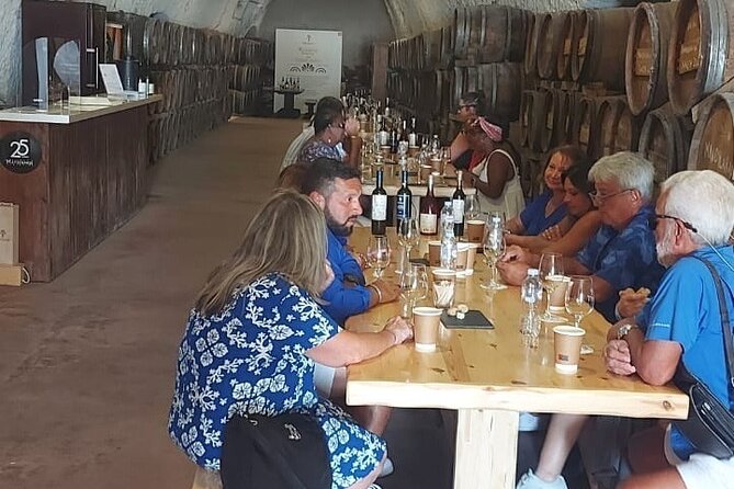 Santorini: Wine Tour with Sunset in Oia - Pickup, group size, and timing