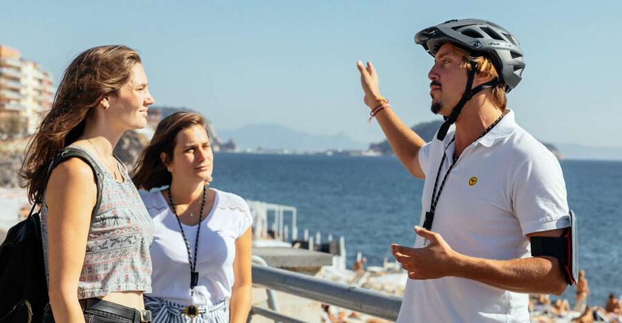 Scenic E-Bike Ride with Vineyard Wine & Meal - Pozzuoli waterfront views and busy roads