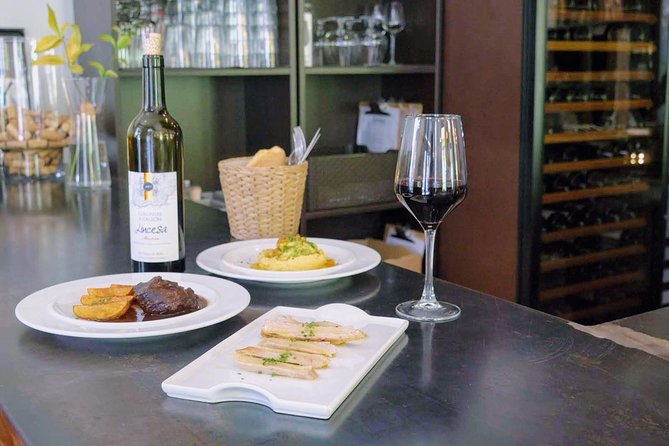 Sevilla Food Tour: Tapas, Wine, History & Traditions - Santa Cruz: meatballs, pestiños, and PX