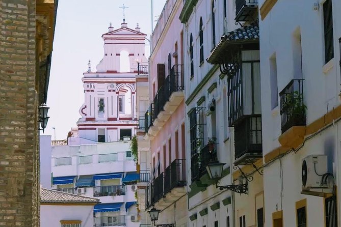 Sevilla Food Tour: Tapas, Wine, History & Traditions - Los Soportales: chicharrones and a montadito