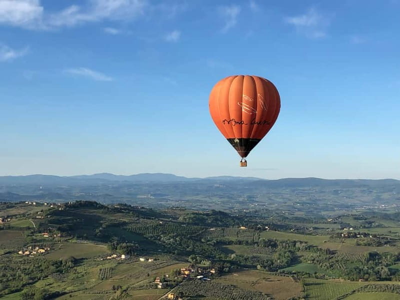 Siena: Balloon Flight Over Tuscany with a Glass of Wine - The calmest hour of your Tuscan trip