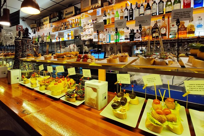 Spanish Wine and Tapas Tour in a Local Neighborhood in Barcelona - The guides are a major part of the experience