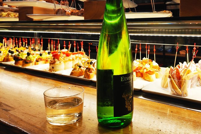 Spanish Wine and Tapas Tour in a Local Neighborhood in Barcelona - Four bars, four glasses, and a tour of Spain by wine