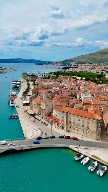 Split: Blue Lagoon & 3 Island Cruise with Wine & Snorkeling - Blue Lagoon: clear water and a busy popular stop