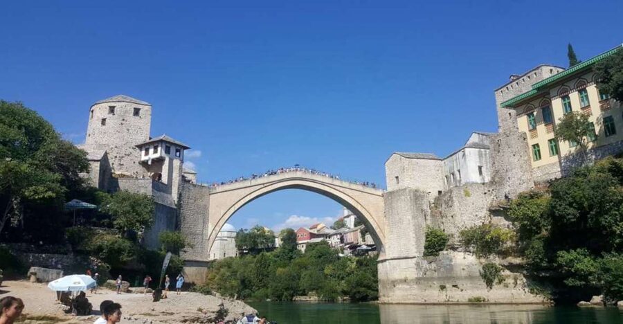 Split/Trogir: Mostar and Medjugorje Tour with Wine Tasting - Arriving in Mostar and crossing the Old Bridge