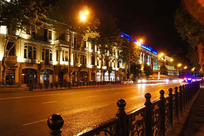 Tbilisi:Evening Walking & Talking Tour with Wine & Boat Ride - The Gabriadze clock tower and the Bridge of Peace