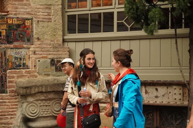 Tbilisi: Evening Walking Tour with Wine & Boat Ride Options - Guide quality and the social feel