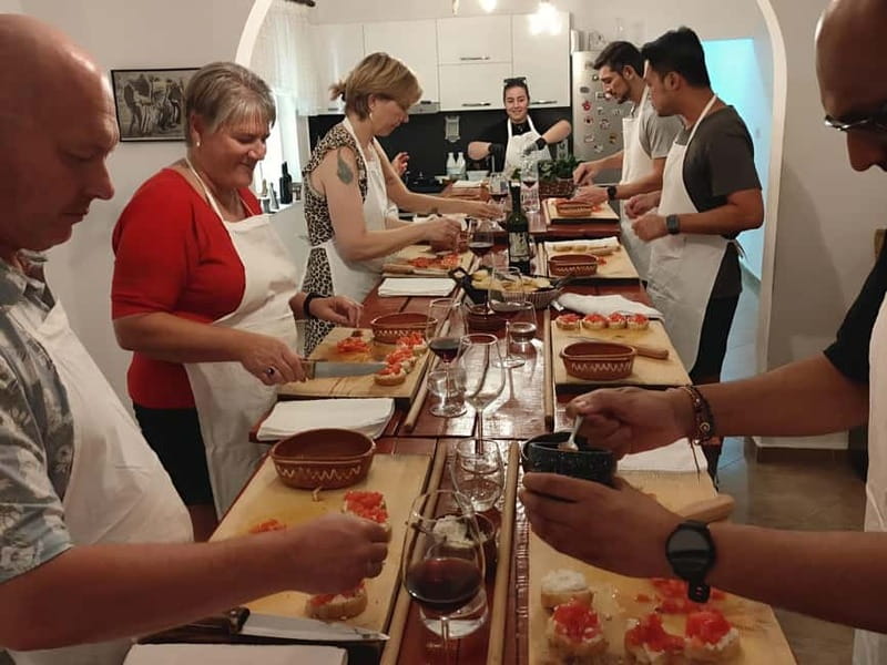 Tirana: Traditional Cooking Class with Wine & Raki Tasting - Arriving to a prepared Albanian kitchen