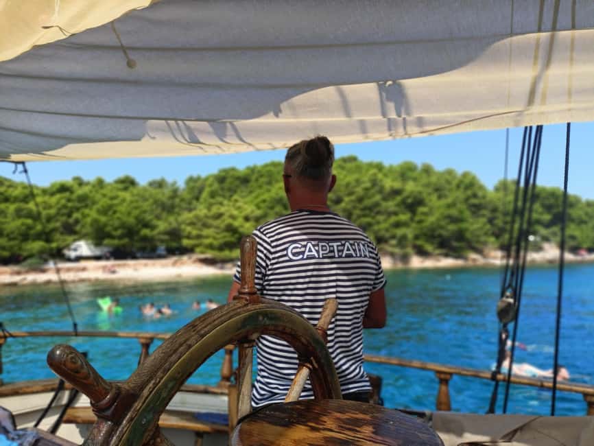 Zadar: Boat Tour with Unlimited Wine & 3 Stops - Unlimited wine, snacks, and the social mood